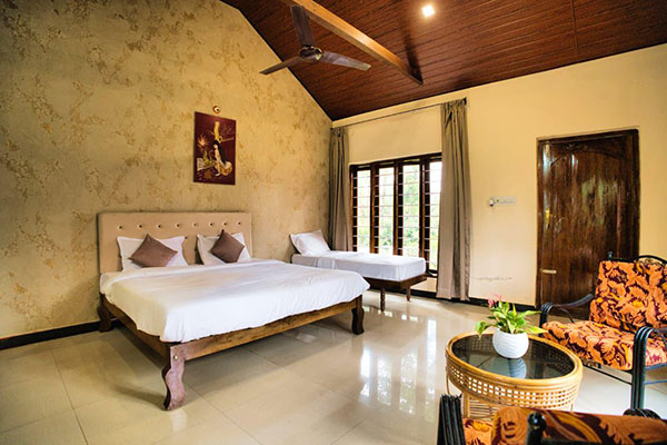 Triple room at Coffee County Coorg, ideal for families and groups